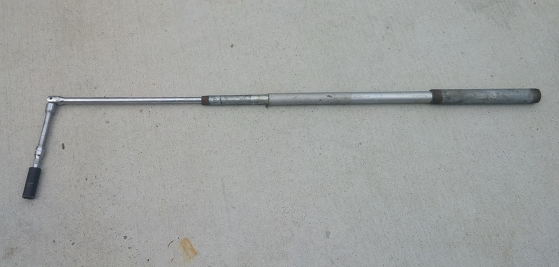 Put a pipe on the end of your wrench for more leverage.